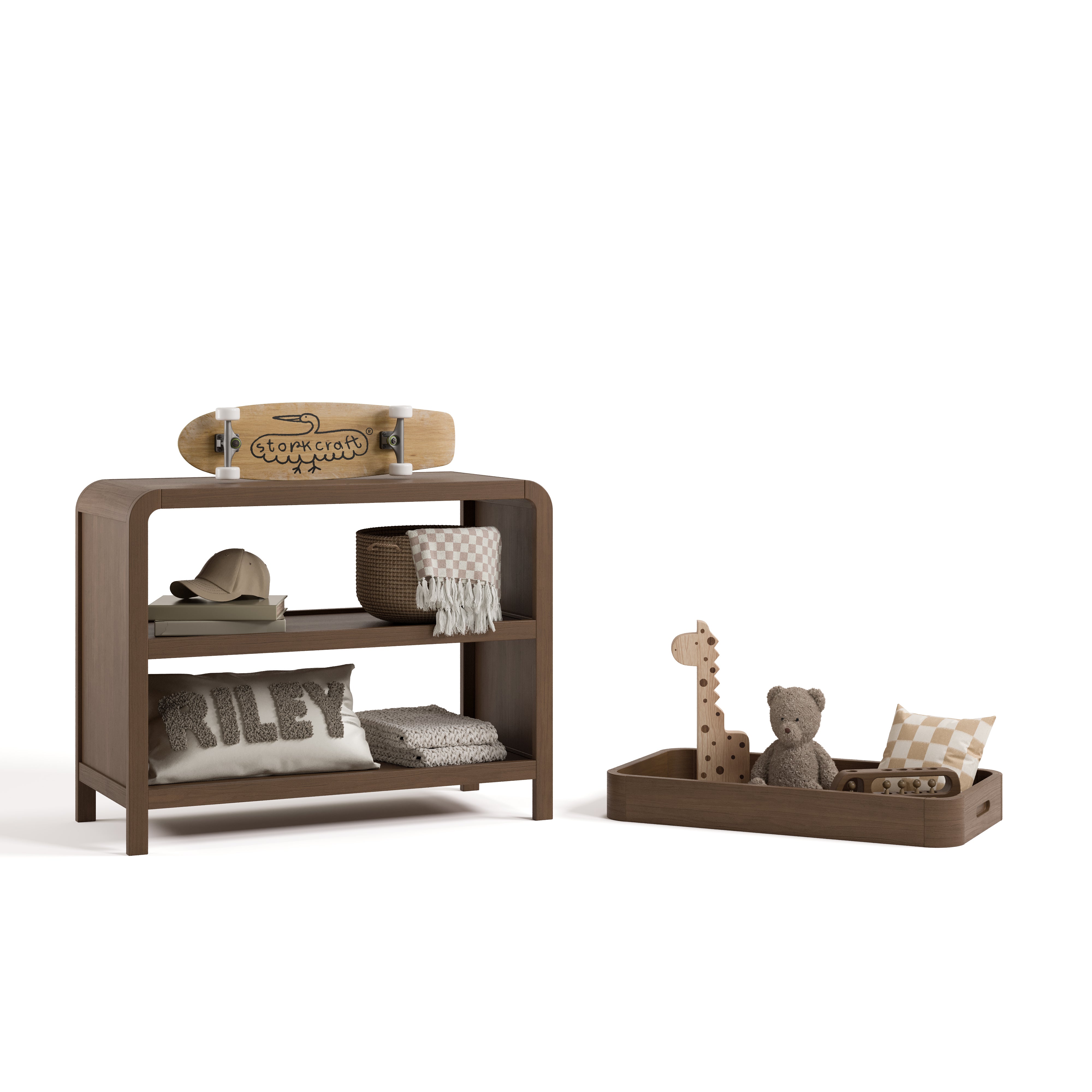 Santos hazelnut changing table with changing topper removed to the right and kids essentials on top