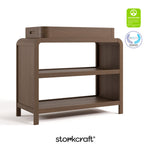 Santos hazelnut changing table with GGG and PTPA logos on top right
