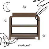 Santos hazelnut changing table with black doodles overlaid on image
