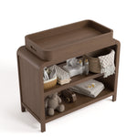 Top view of Santos hazelnut changing table with changing essentials on both shelves