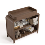 Top view of Santos hazelnut changing table with changing essentials on both shelves