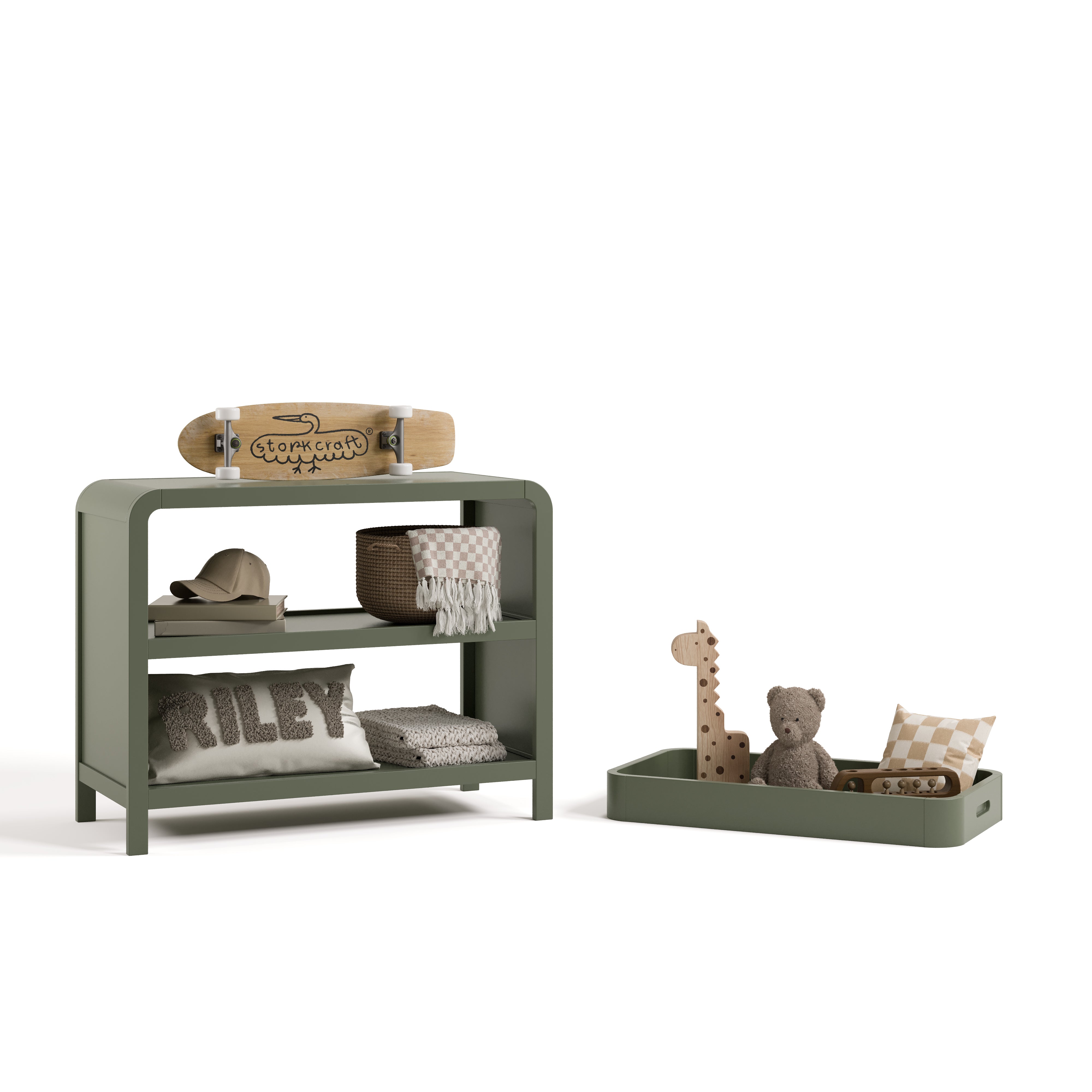 Santos olive changing table with changing topper removed to the right and kids essentials on top