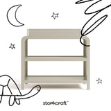 Santos frosted oat changing table with black doodles overlaid on image