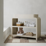 Santos frosted oat changing table in a nursery