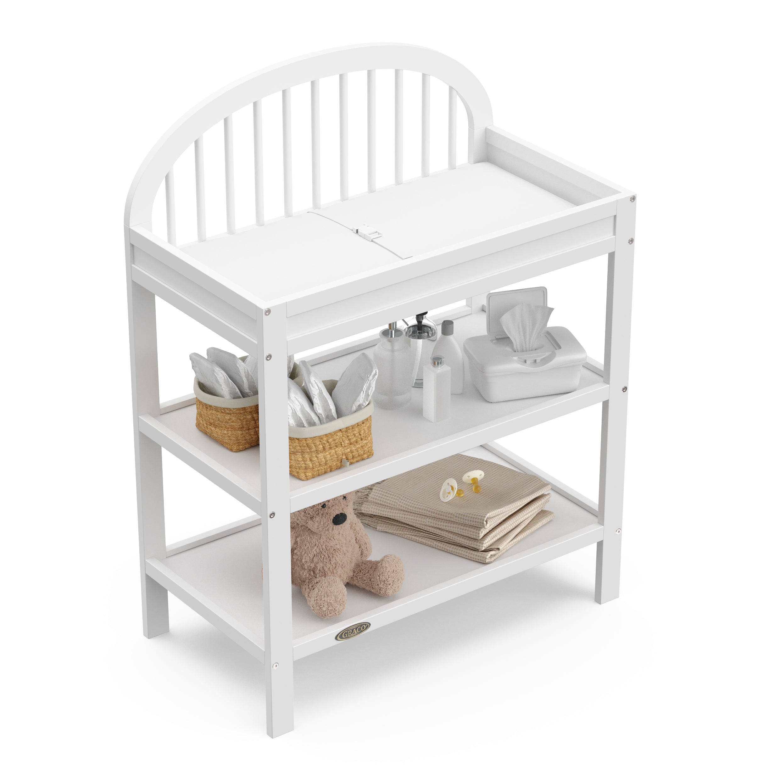 Olivia white changing table top view with baby items on both shelves