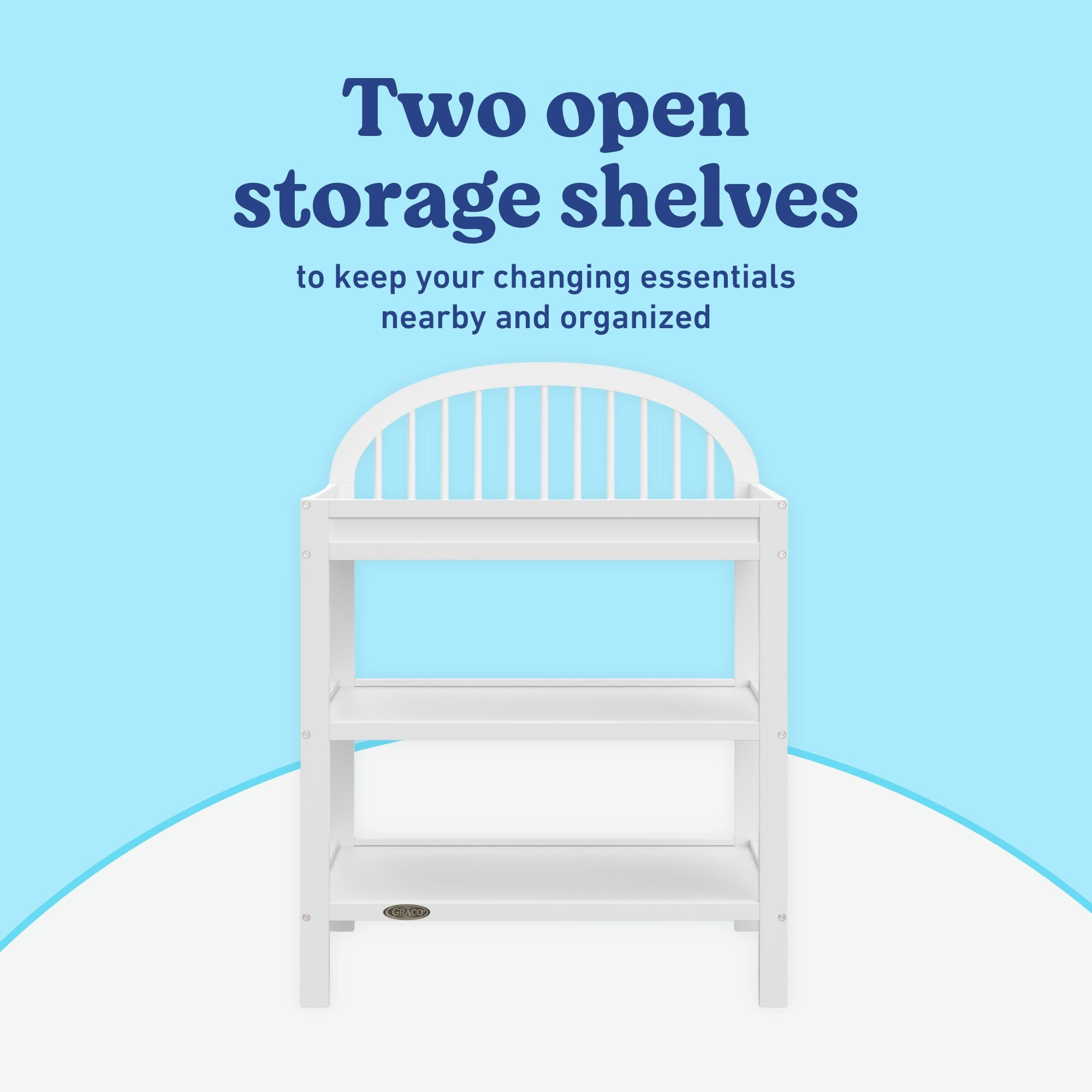 Olivia white changing table open shelves callout