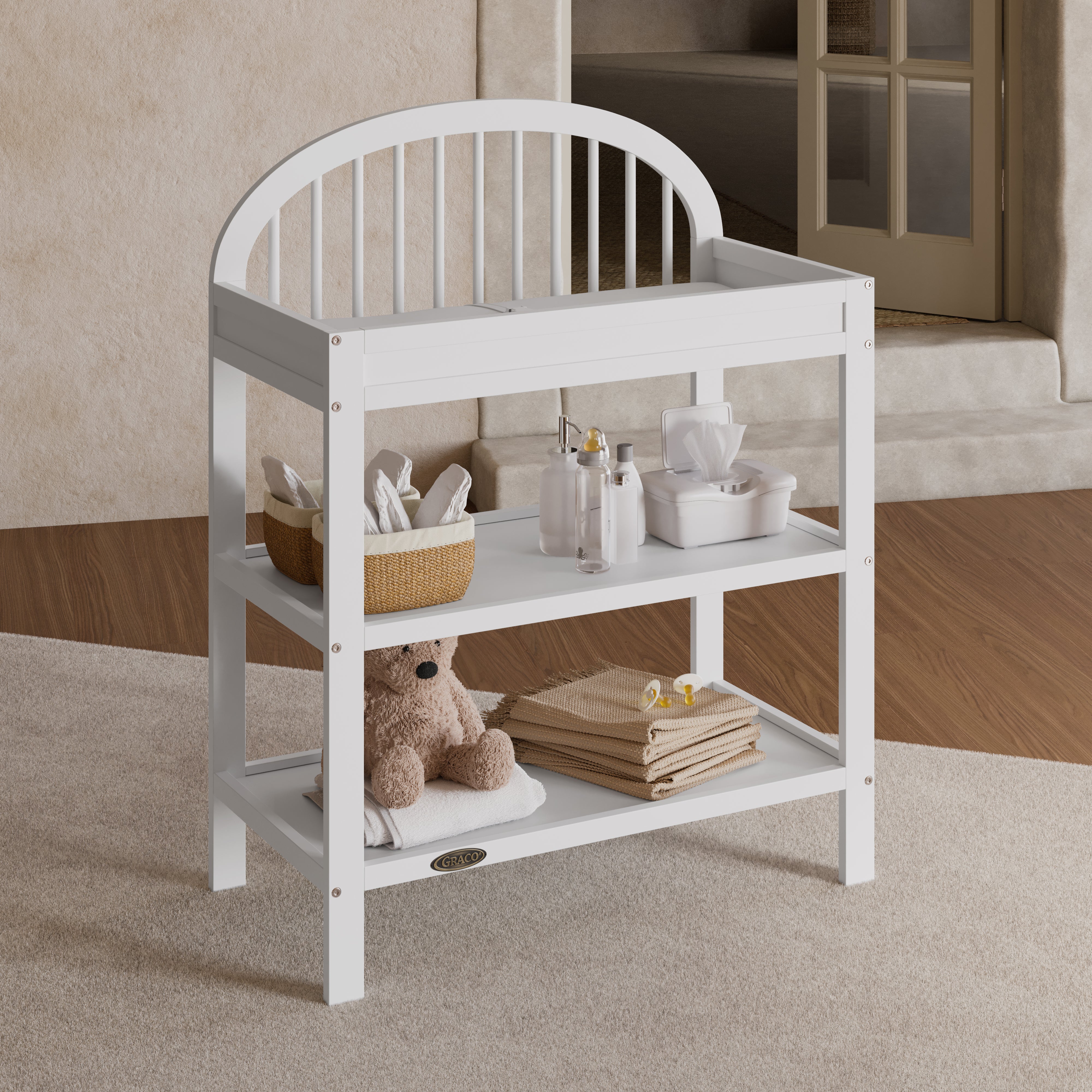 Olivia white changing table in a nursery