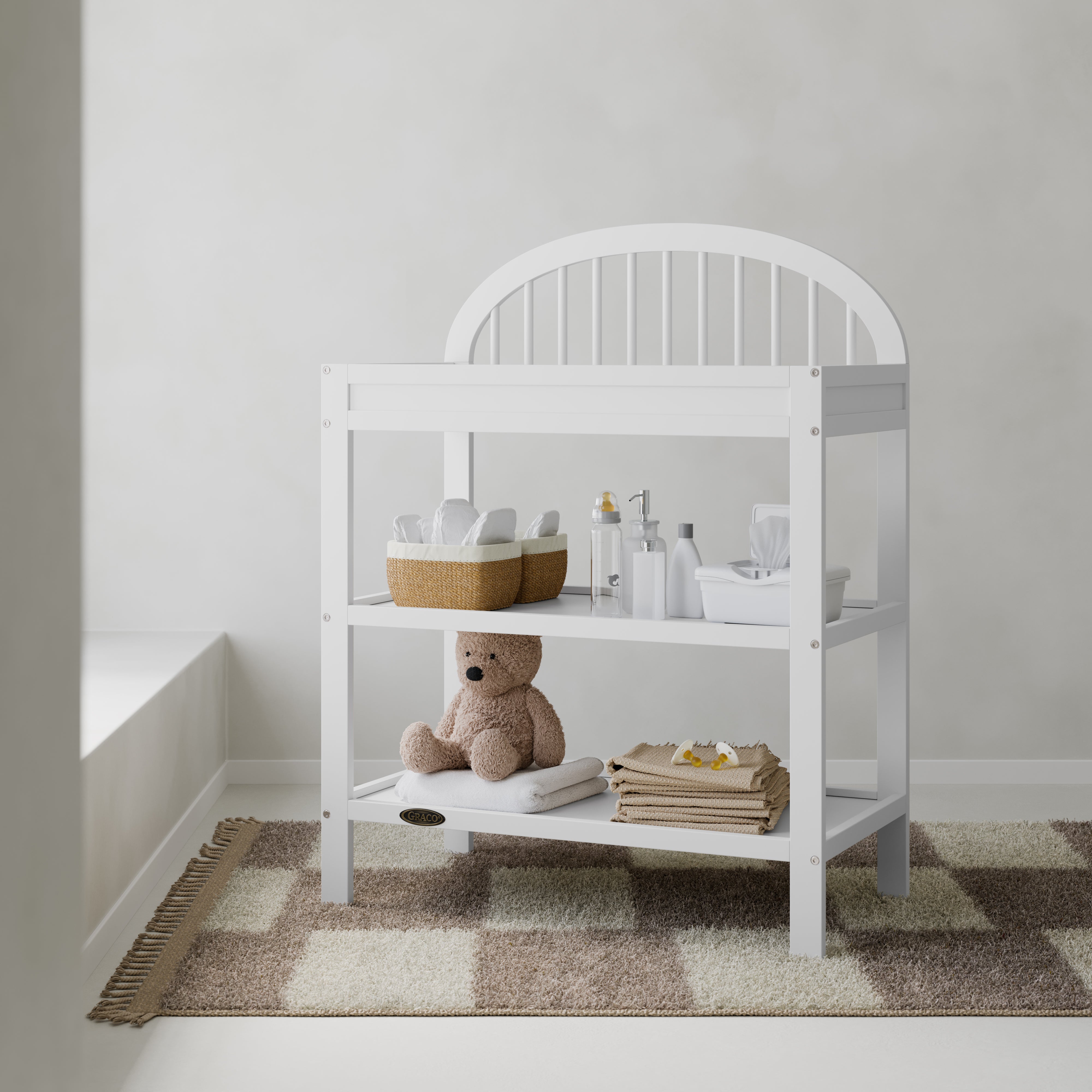 Olivia white changing table in a nursery
