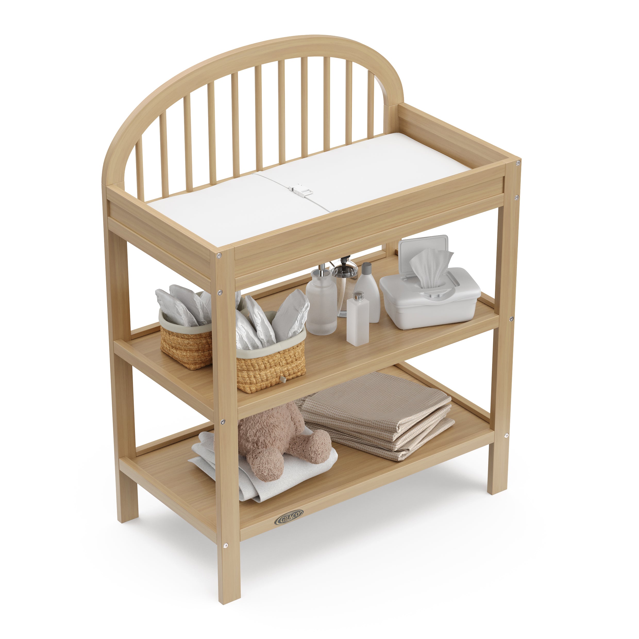 Olivia driftwood changing table top view with baby items on both shelves