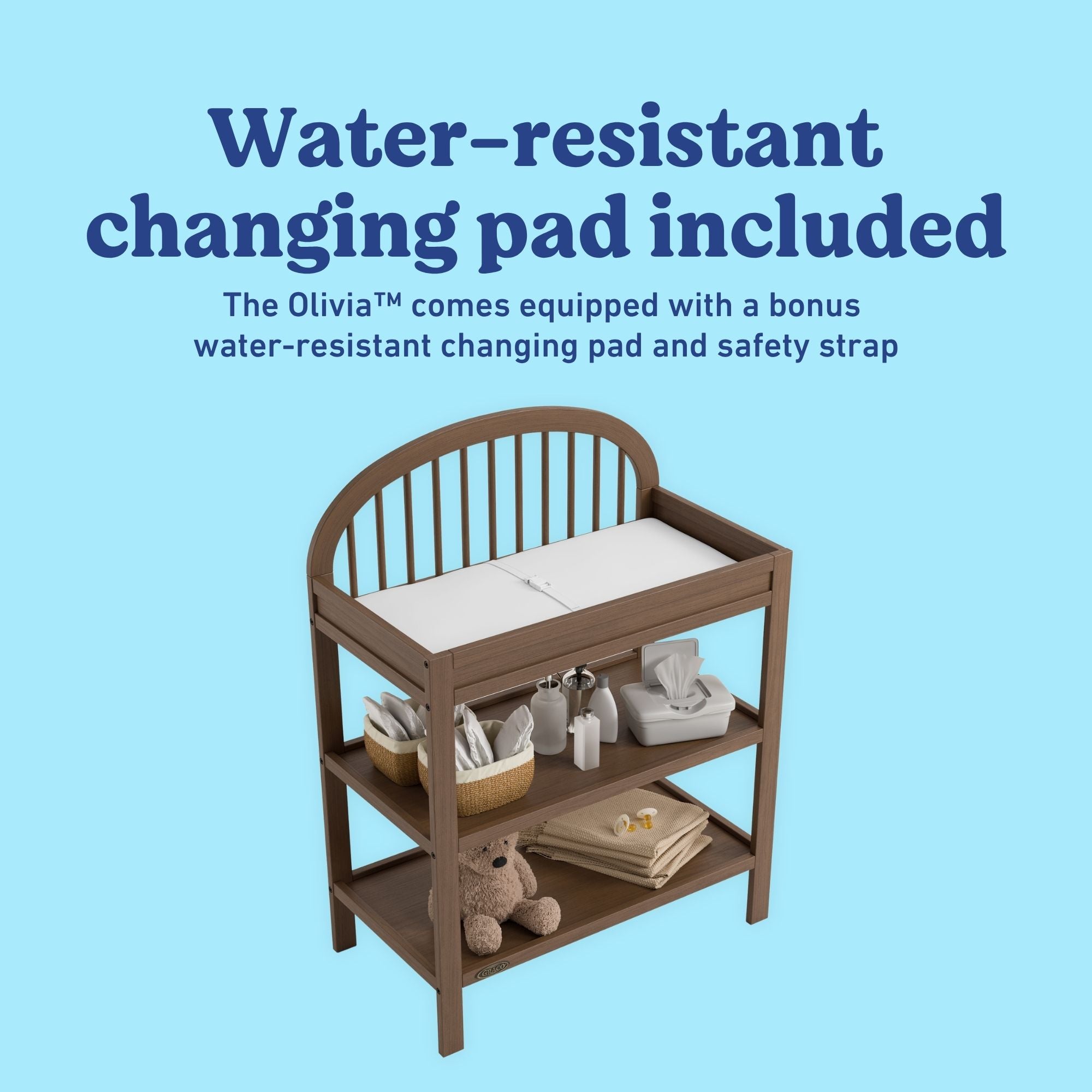 Olivia® Changing Table with Bonus Water-Resistant Changing Pad