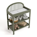 Olivia olive changing table top view with baby items on shelves