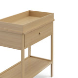 Driftwood Graco storage changing table close up of changing topper and drawer