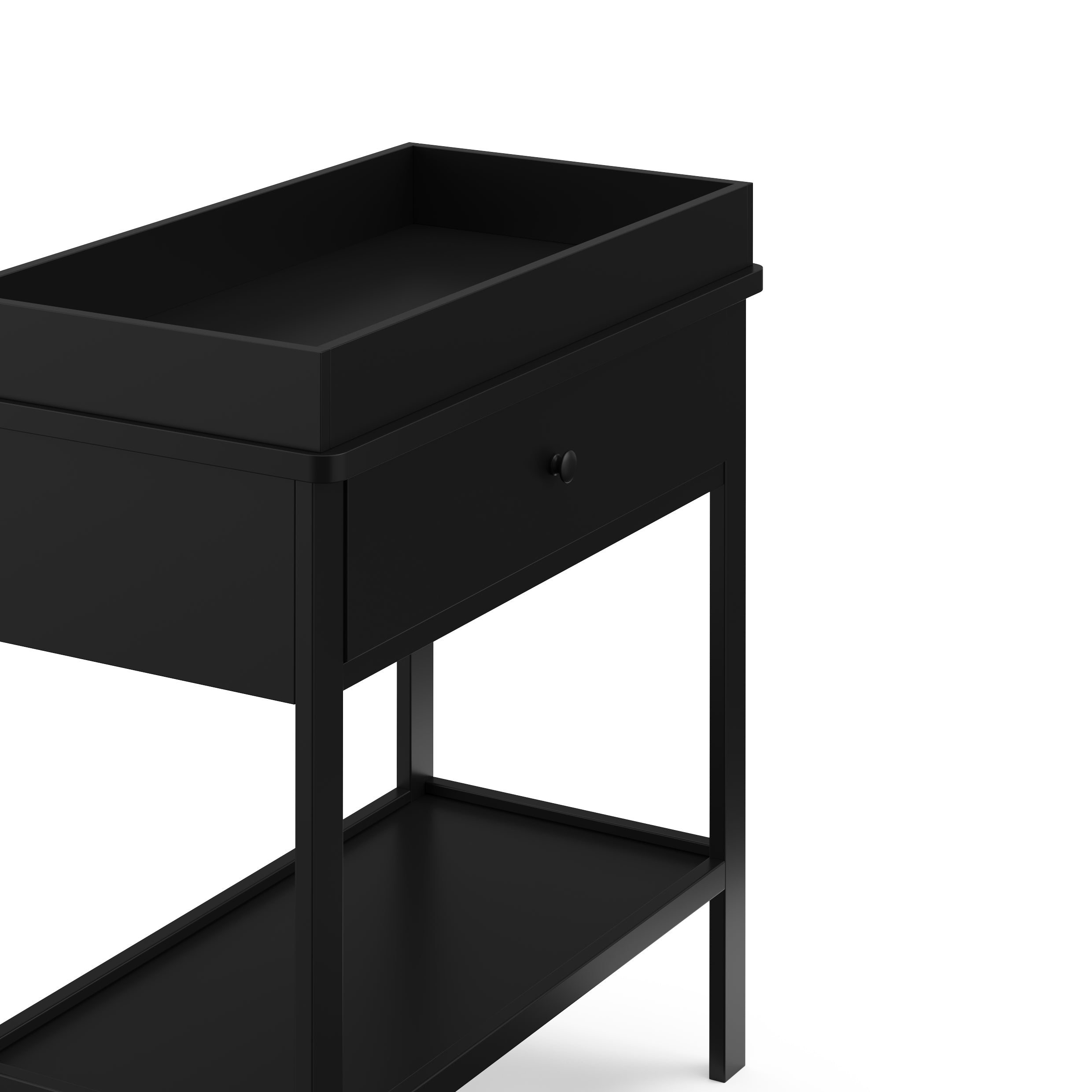 Black Graco storage changing table close up of changing topper and drawer