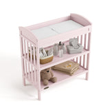 Benton blush changing table top view with changing essentials on both shelves