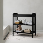 Benton black changing table in a nursery