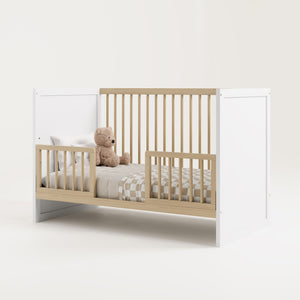 Driftwood Toddler Safety Guardrail Kit with dowels applied in toddler bed