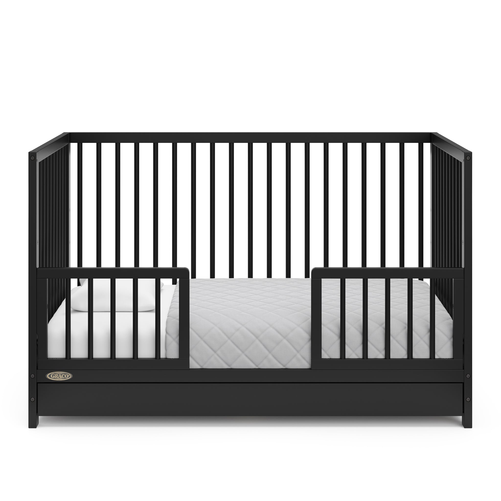 Black Toddler Safety Guardrail Kit with dowels applied in toddler bed