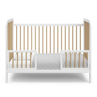 White with driftwood Toddler Safety Guardrail Kit with dowels applied in toddler bed