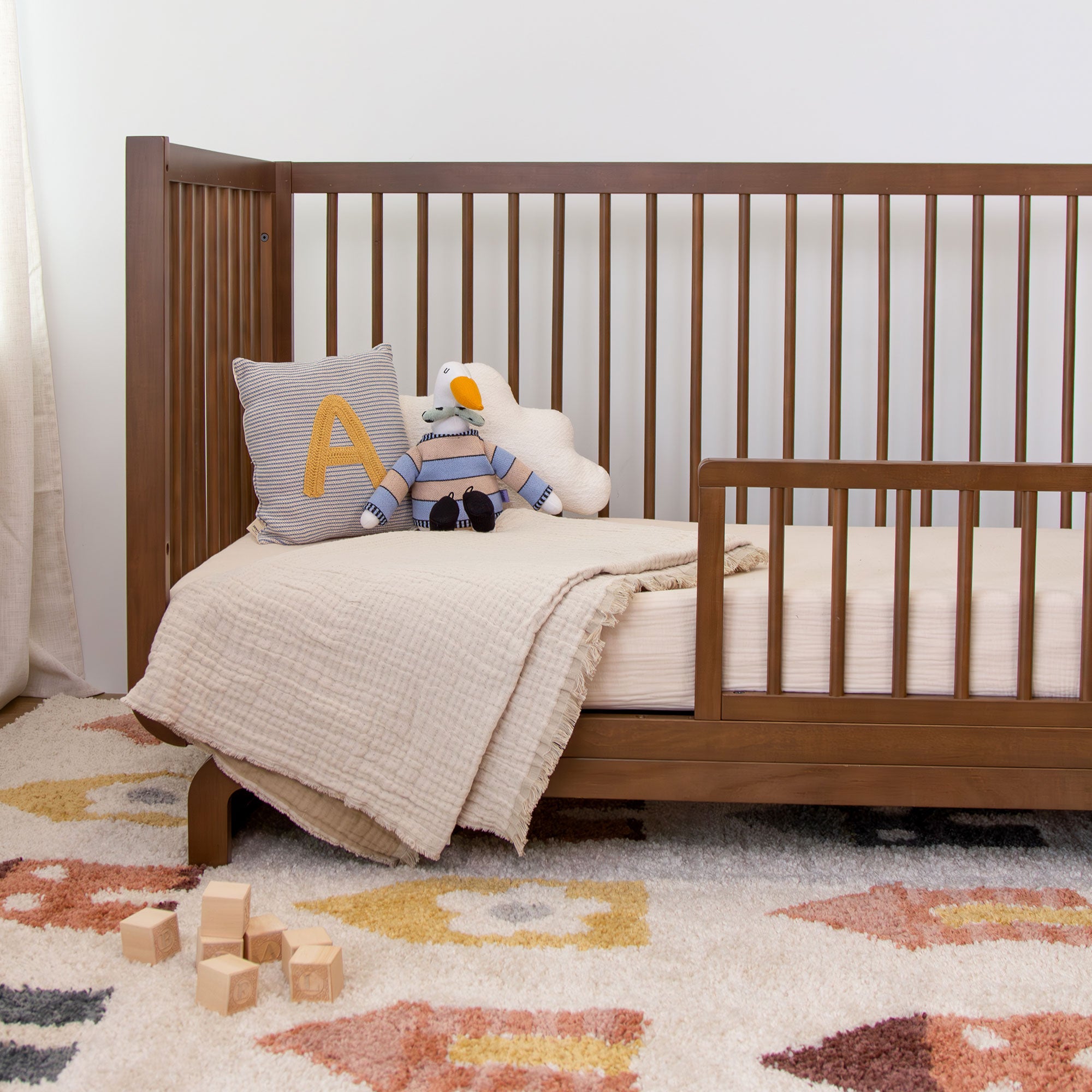 AJ the Stork Plush Toy with the Storkcraft Santorini Crib