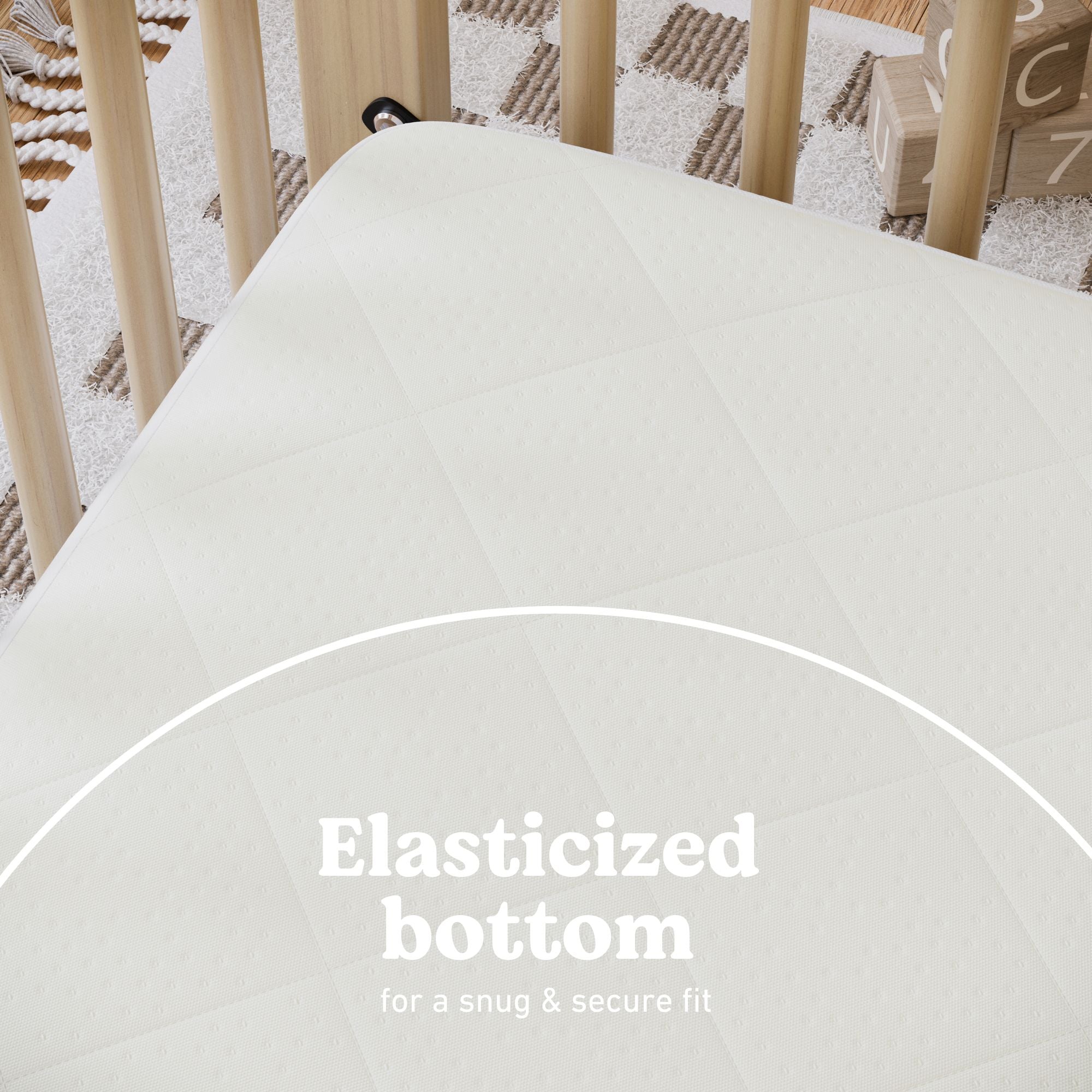 graco premium waterproof crib and toddler mattress protector elasticized bottom callout