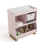 storkcraft modern convertible changing table blush with driftwood top view with changing pad and baby items inside storage cubbies