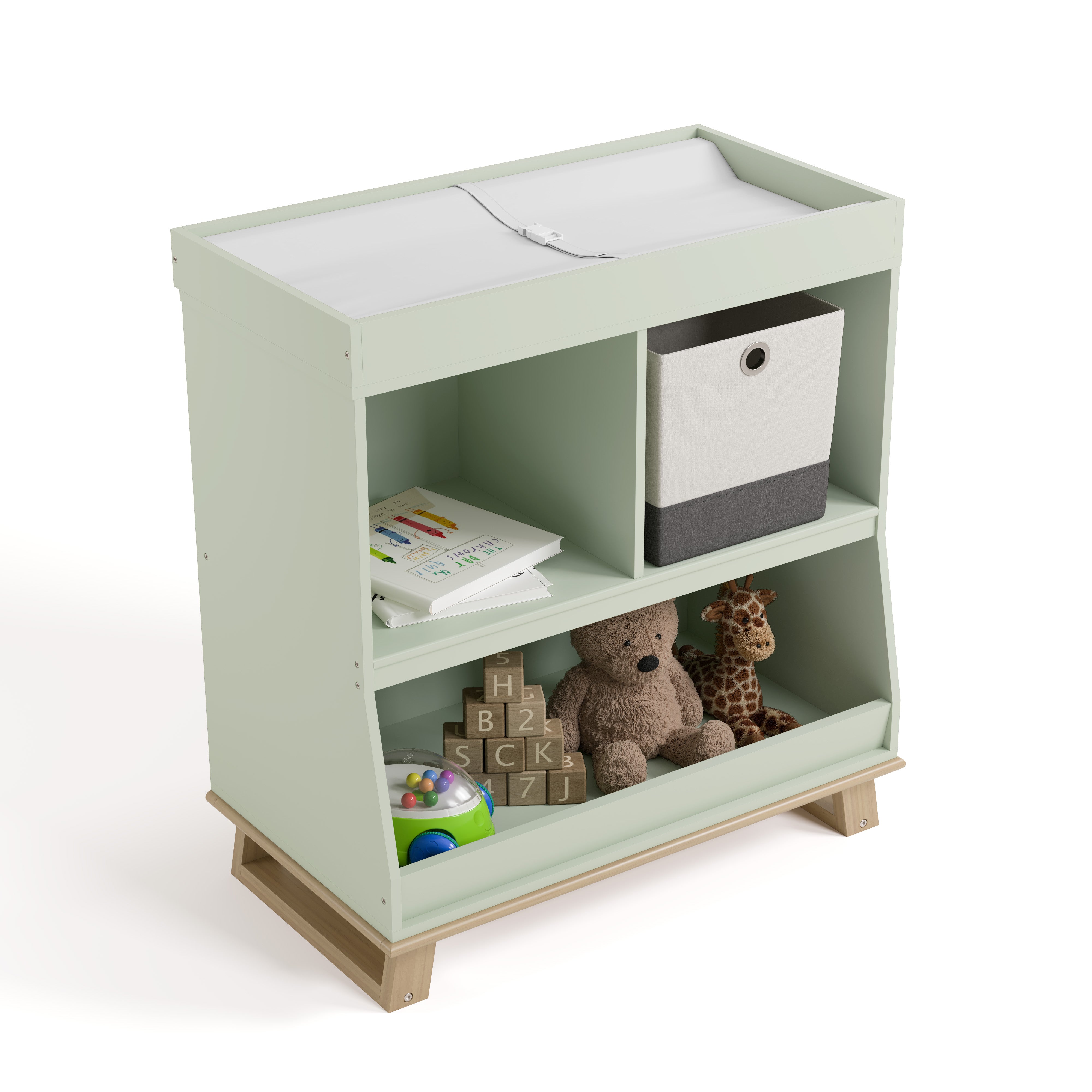 storkcraft modern convertible changing table sage with driftwood top view with changing pad and baby items inside storage cubbies