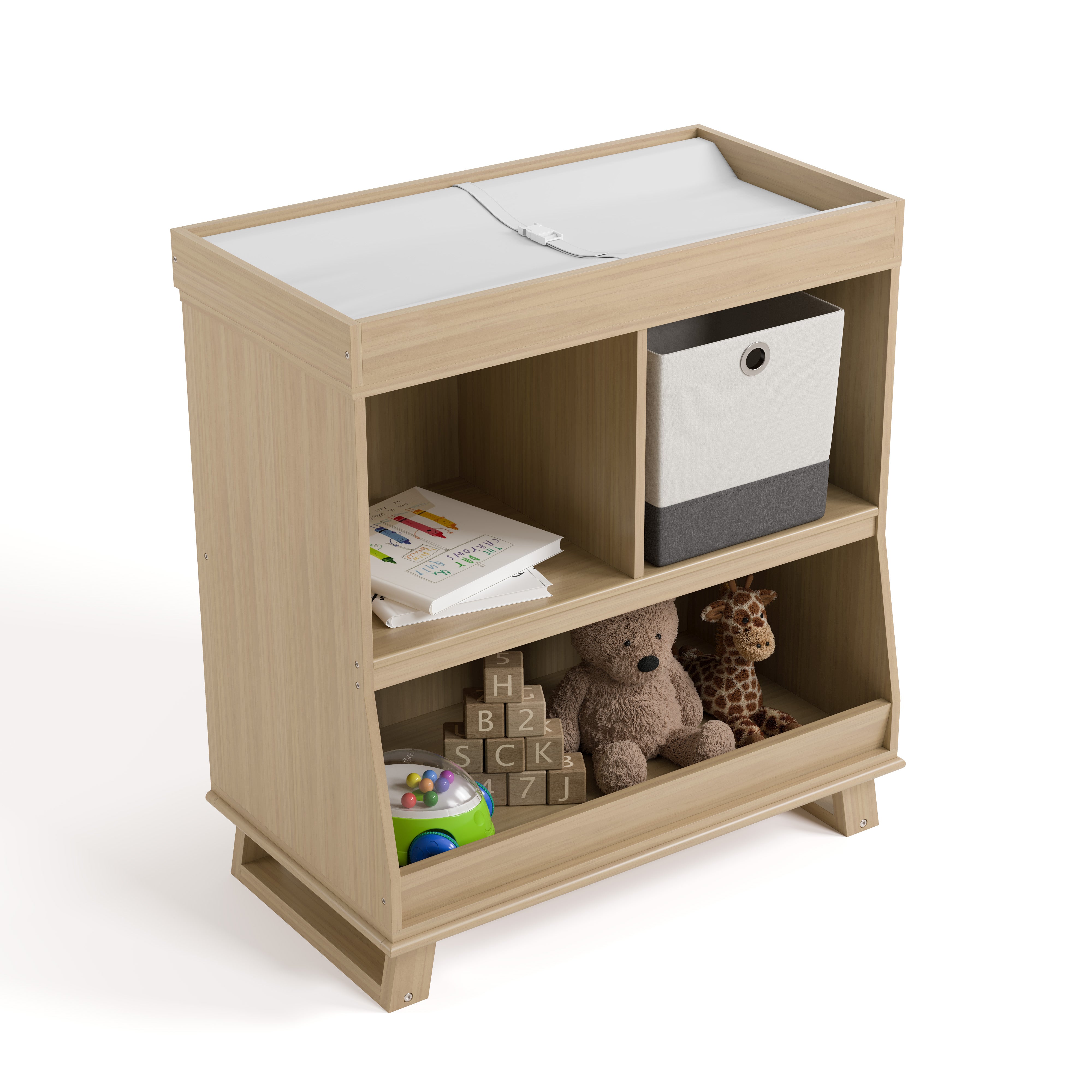 storkcraft modern convertible changing table driftwood top view with changing pad and baby items inside storage cubbies