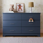 Brookside midnight blue 6 drawer dresser in a nursery
