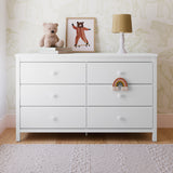 Alpine white 6 drawer dresser in a nursery
