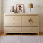 Alpine driftwood 6 drawer dresser in a nursery