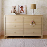 Alpine driftwood 6 drawer dresser in a nursery