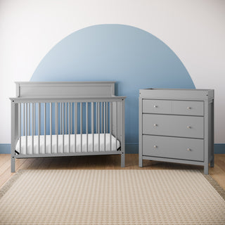pebble gray 3 drawer chest with changing topper with crib in nursery