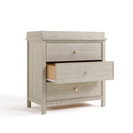 Graco Sasha 3 Drawer Chest with Removable Changing Table Topper in London Fog angled image