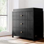Teddi black with driftwood knobs 3 drawer chest with changing topper in a nursery