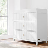 Teddi white with driftwood knobs 3 drawer chest with changing topper in a nursery