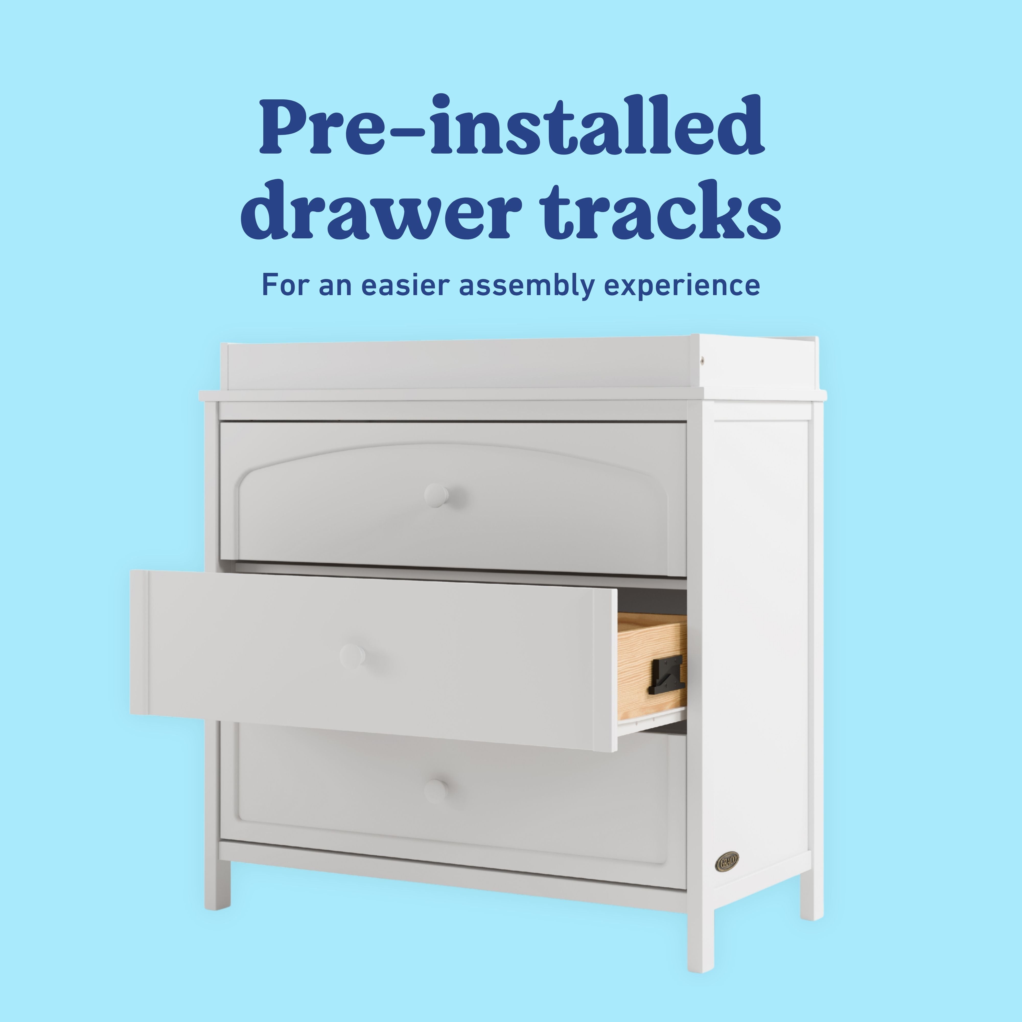 Olivia white 3 drawer chest with changing topper pre-installed tracks callout