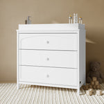 Olivia white 3 drawer chest with changing topper in a nursery