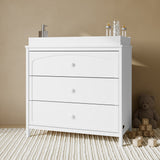 Olivia white 3 drawer chest with changing topper in a nursery