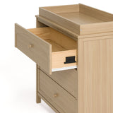 Olivia driftwood 3 drawer chest with changing topper with top drawer open showing interlocking drawer mechanism