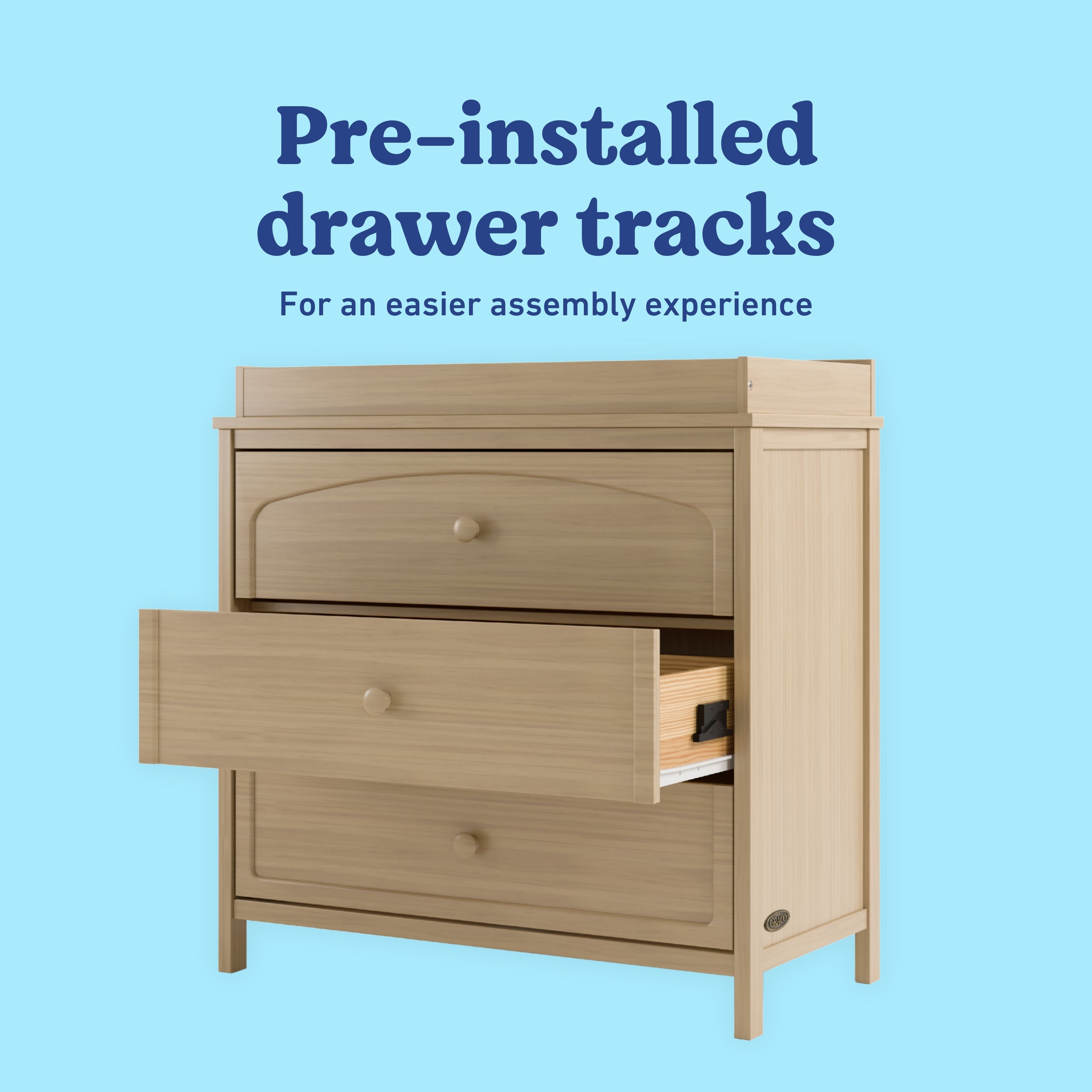 Olivia driftwood 3 drawer chest with changing topper pre-installed tracks callout