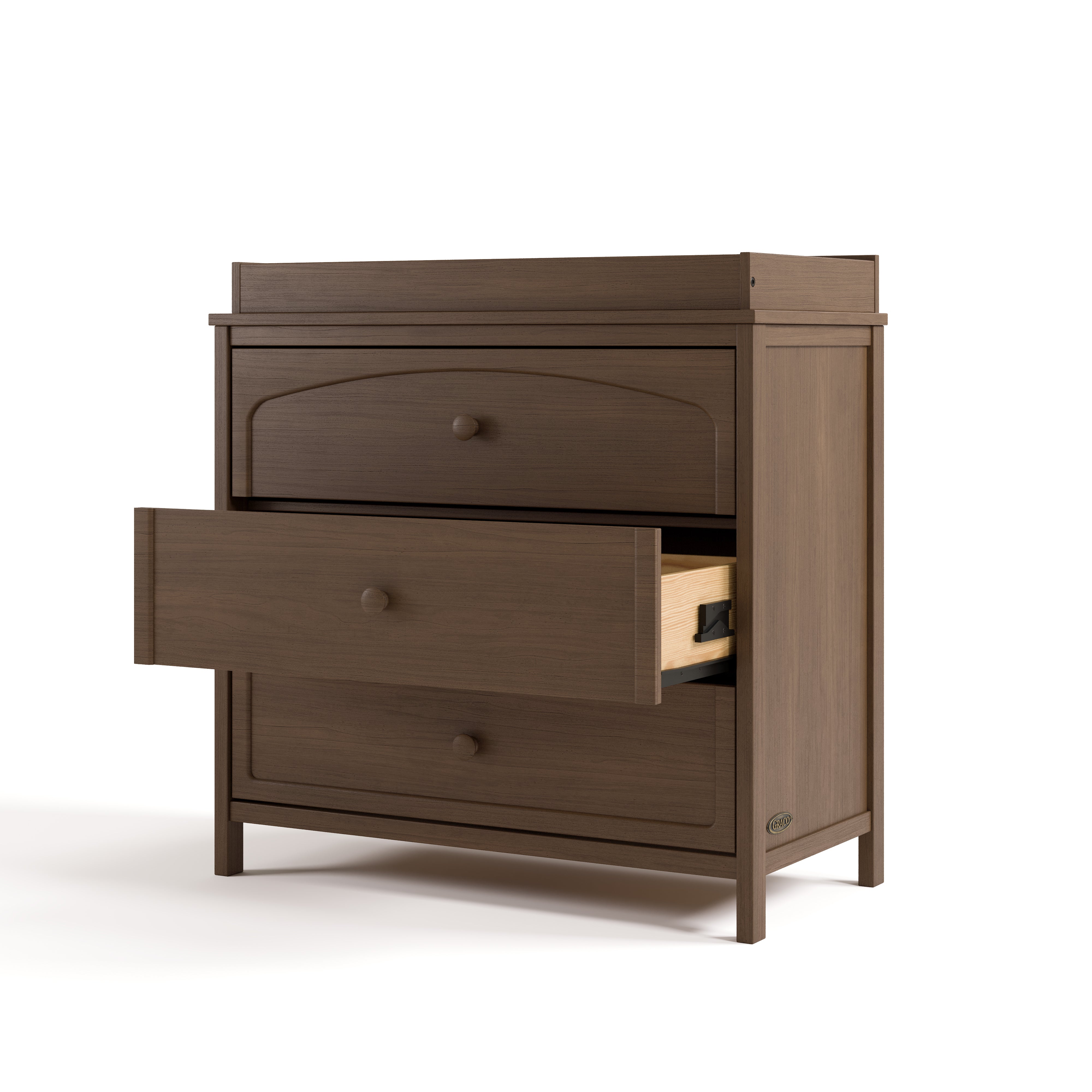Olivia hazelnut 3 drawer chest with changing topper with middle drawer open angle view