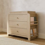 Read-with-Me driftwood 3 drawer chest with changing topper in a nursery