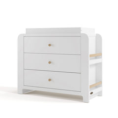 Angle view of Read-with-Me 3 drawer chest with bookshelves and changing topper in white with driftwood