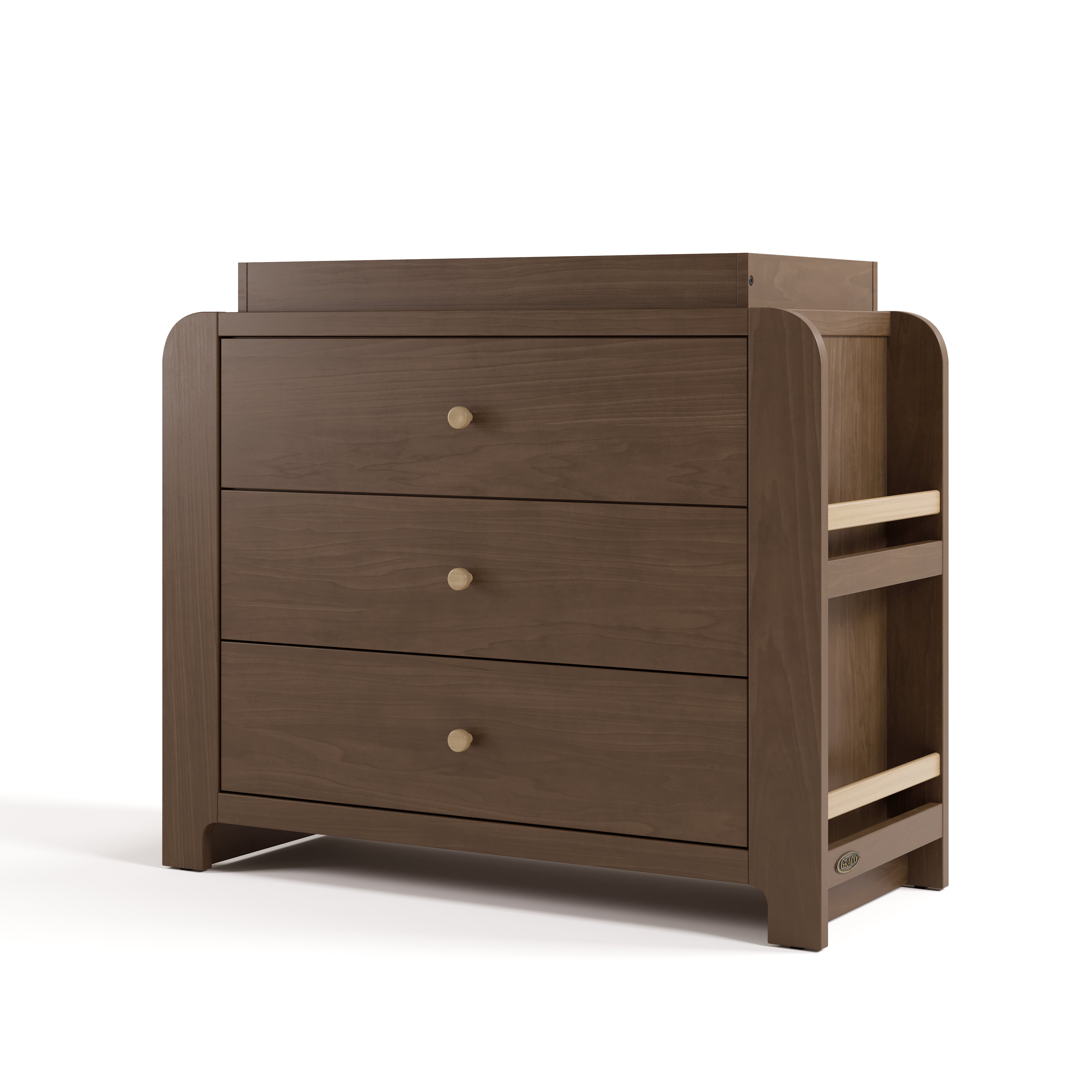 Angle view of Read-with-Me 3 drawer chest with bookshelves and changing topper in hazelnut with driftwood