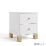 California white and driftwood 2 drawer nightstand angle view with 2025 Storkcraft copyright on bottom right
