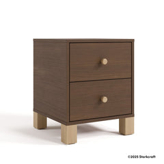 California hazelnut with driftwood 2 drawer nightstand with 2025 Storkcraft copyright on bottom right