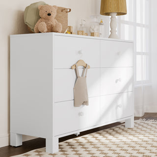 White dresser in nursery setting