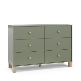 Angled view of olive dresser with driftwood knobs and base