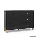 California black with driftwood 6 drawer dresser with 2024 Storkcraft copyright on bottom right