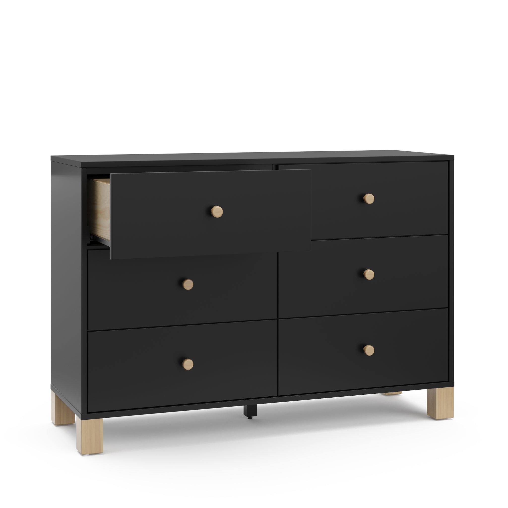 Angled view of black dresser with driftwood knobs and one open drawer